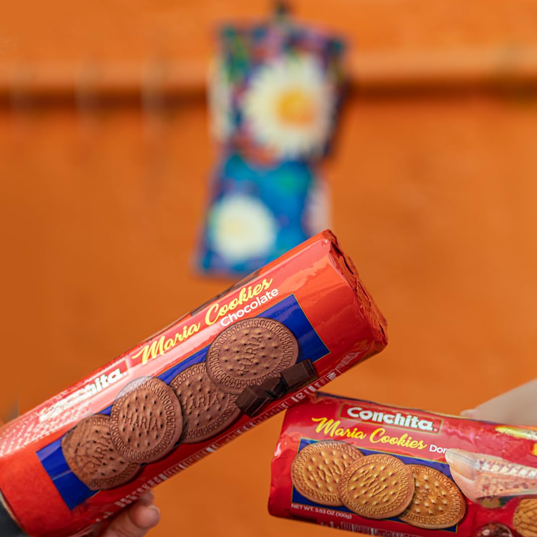Conchita Chocolate Maria Cookies displayed with family photos signaling trusted heritage.