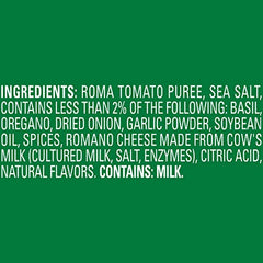 A spoon scoops Contadina tomato paste for quick, flavorful sauces.