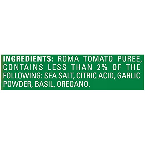 Pouring Contadina Tomato Sauce with Italian Herbs onto pasta, rich and flavorful