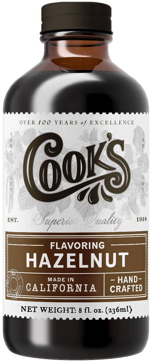COOK'S Pure Hazelnut Flavor bottle enhances baking with rich, buttery notes.
