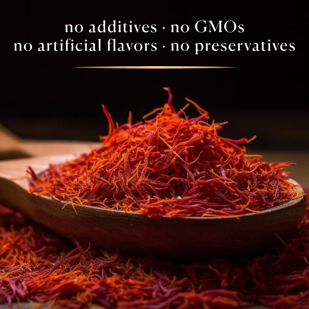 Creamy risotto finished with Cook's saffron threads for vibrant orange hue.
