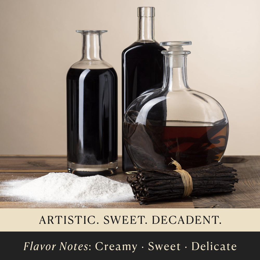 Cook's Vanilla Paste on whipped cream finishing with rich aroma and visible seeds.