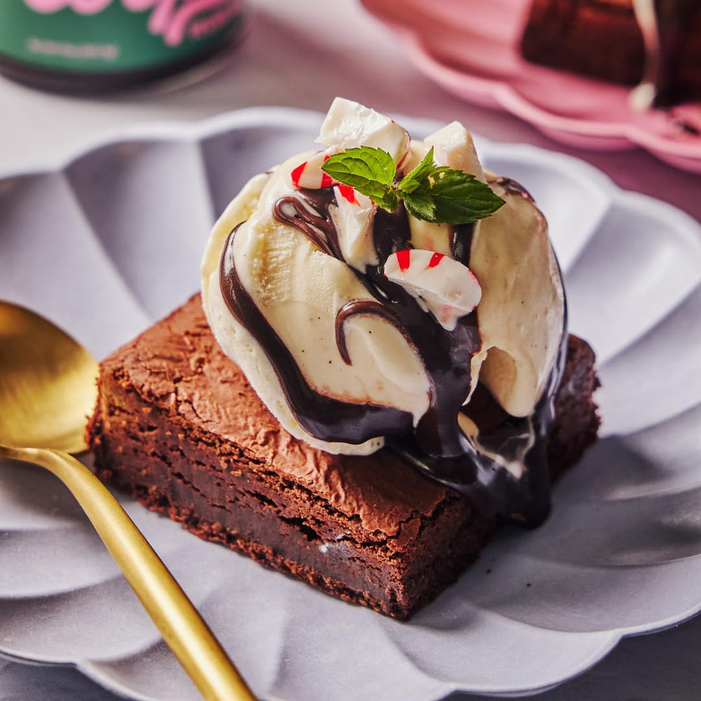 Coop's vegan fudge sauce on pancakes for a sweet breakfast