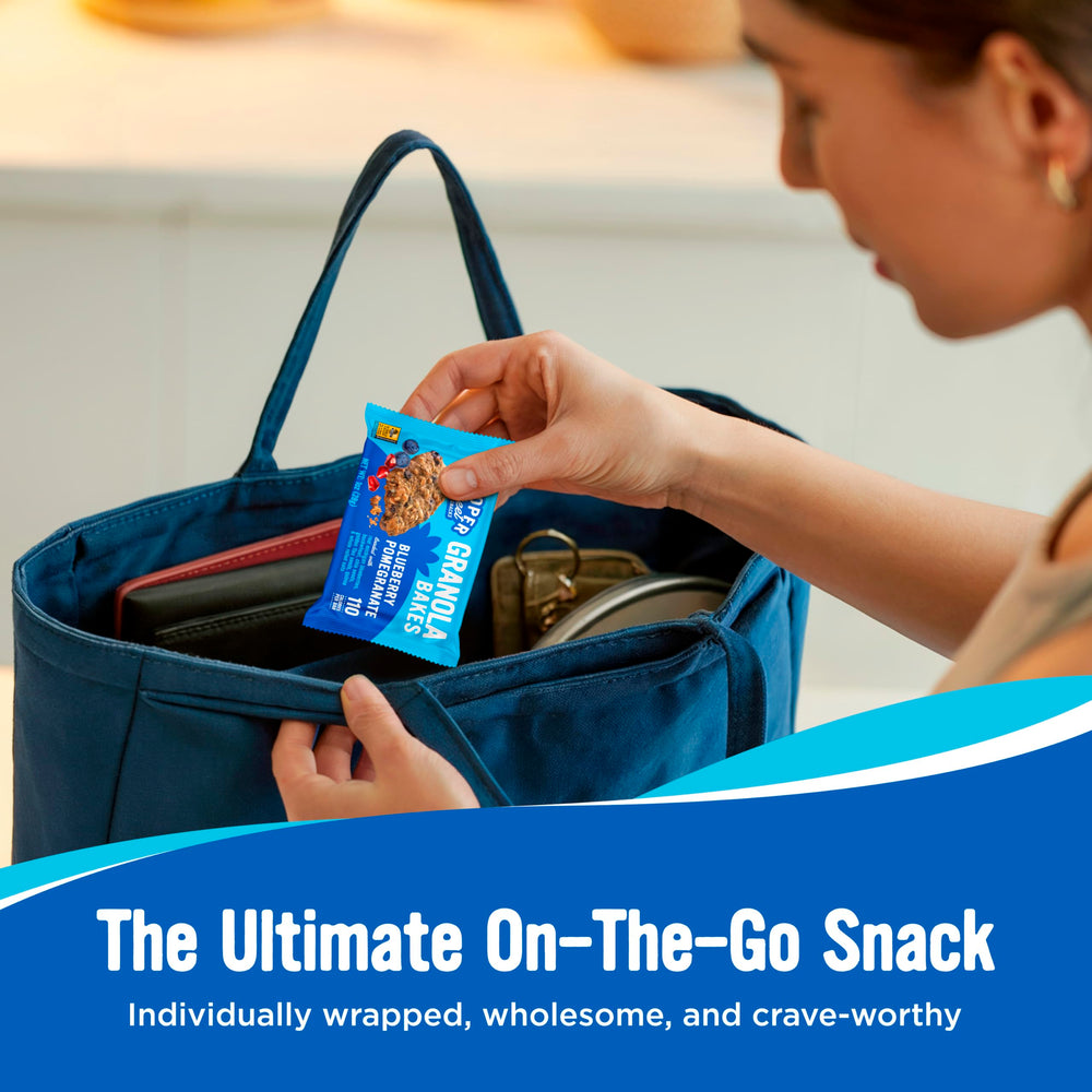 Child placing Cooper Street bar in lunchbox for school snack.