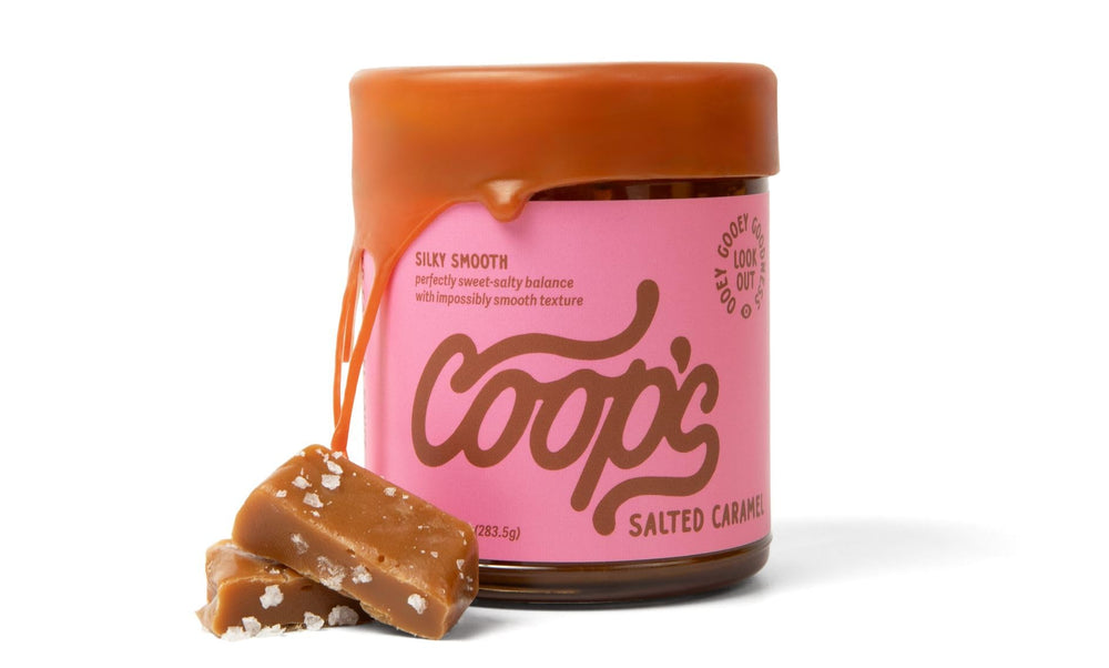 Coop's Salted Caramel Sauce in a glass bottle ready for dessert topping and drizzle