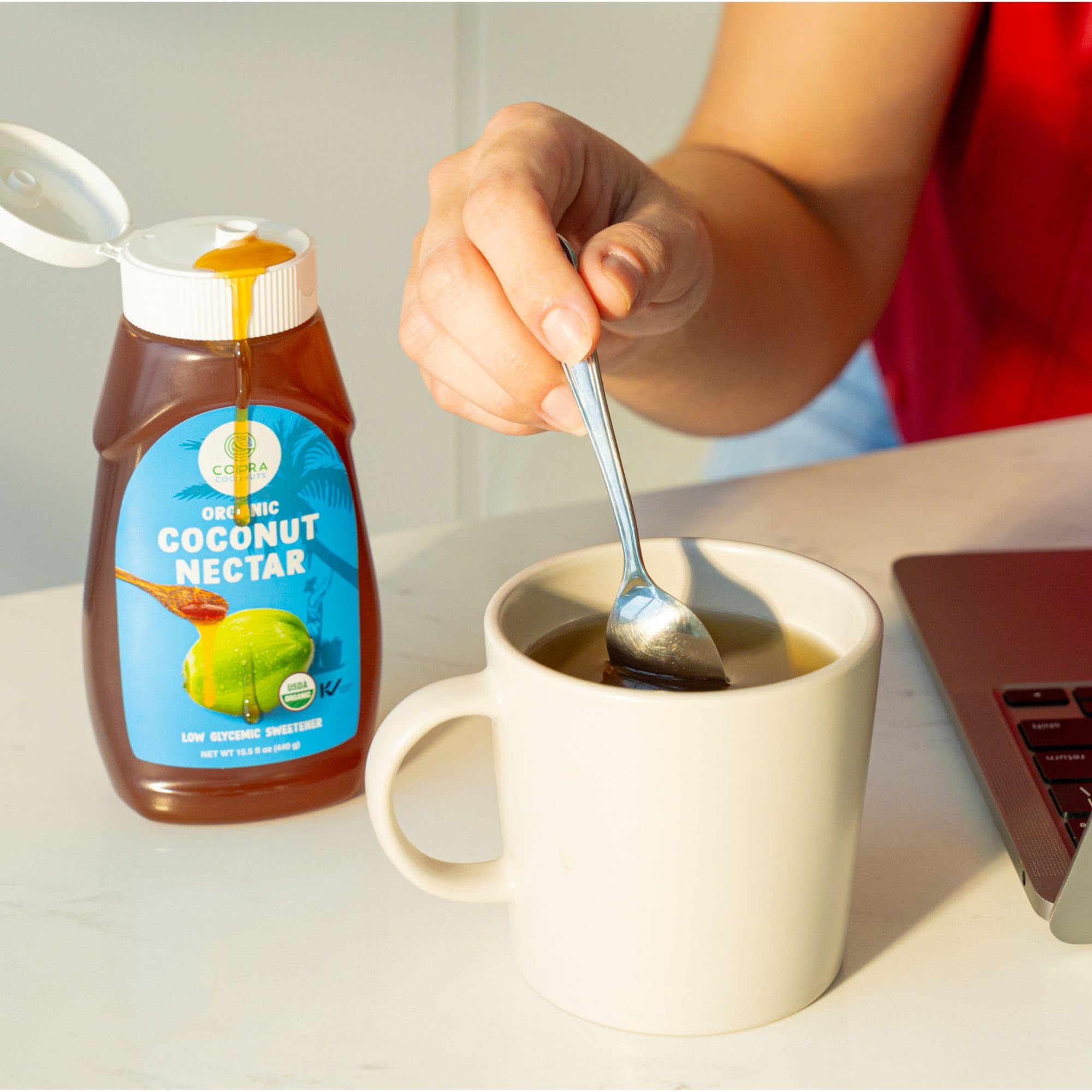 Copra coconut nectar amber liquid closeup; universal kitchen staple