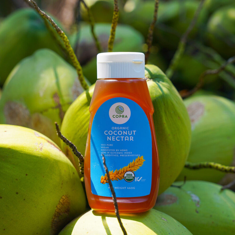 Copra coconut nectar bottle with drizzle; suitable for gluten free and non GMO cooking