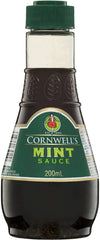 Cornwells Mint Sauce bottle being poured over lamb for a savory mint glaze.
