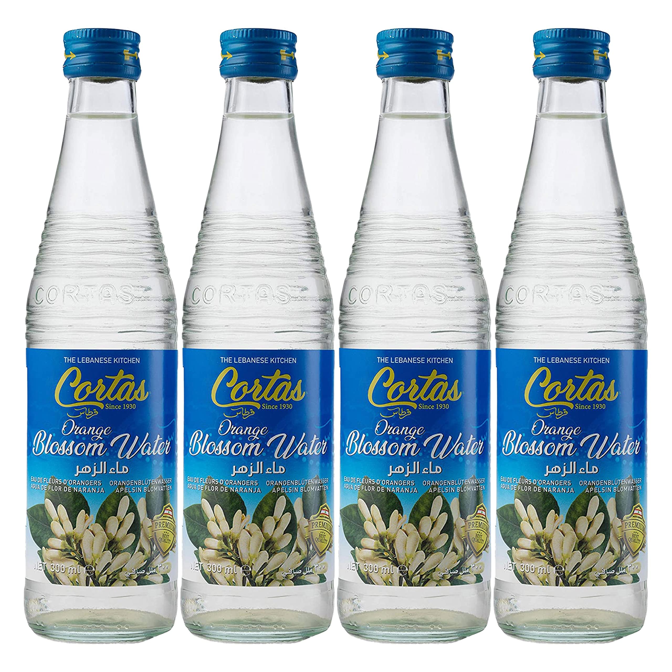 Cortas orange blossom water bottle pouring into a drink for floral citrus aroma