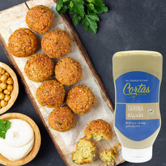 Cortas Tahini creamy texture atop hummus showcasing authentic Lebanese flavor.