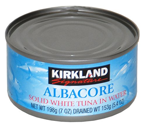 Kirkland albacore tuna in water served with greens, quick lunch.