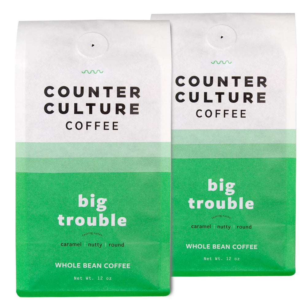Counter Culture Big Trouble whole bean close-up shows caramel notes and round body.