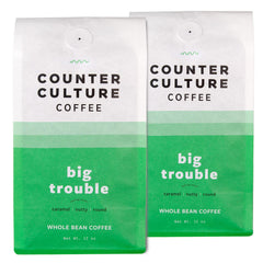 Counter Culture Big Trouble whole bean close-up shows caramel notes and round body.