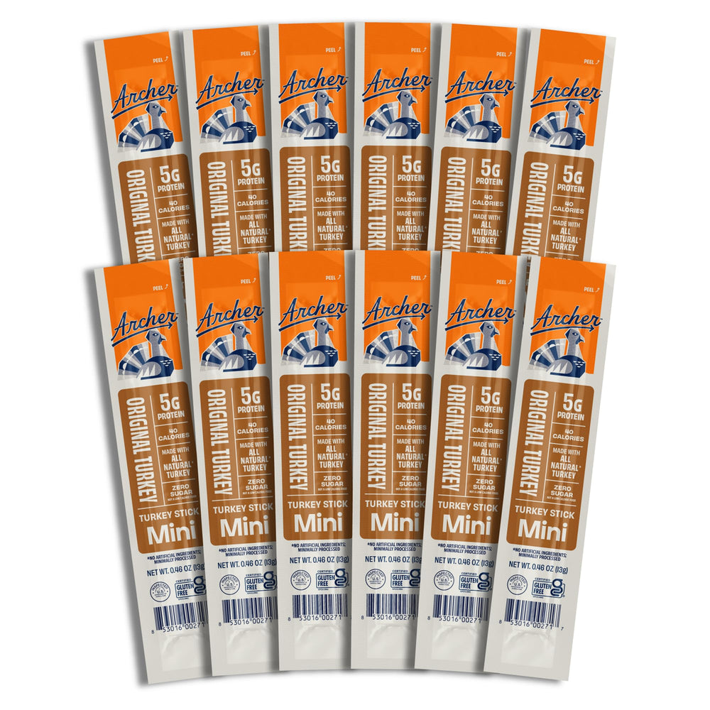Country Archer mini turkey jerky sticks original pack in hand for portable protein snack.