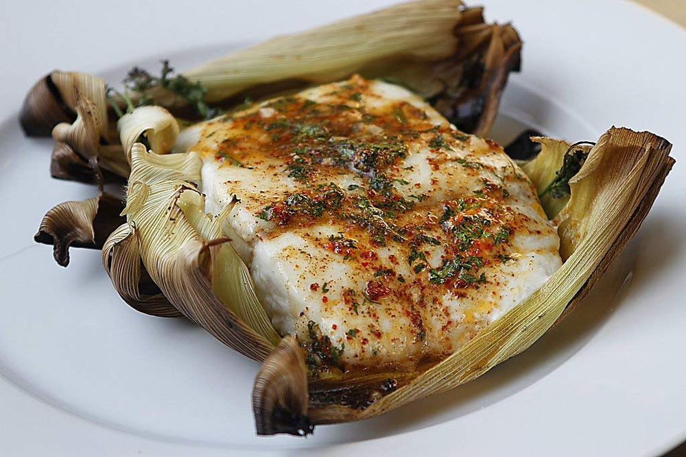 Country Creek Acres corn husk wraps on grill with fish
