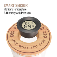 Cozy Bread digital thermometer display on sourdough starter jar for precise readings.