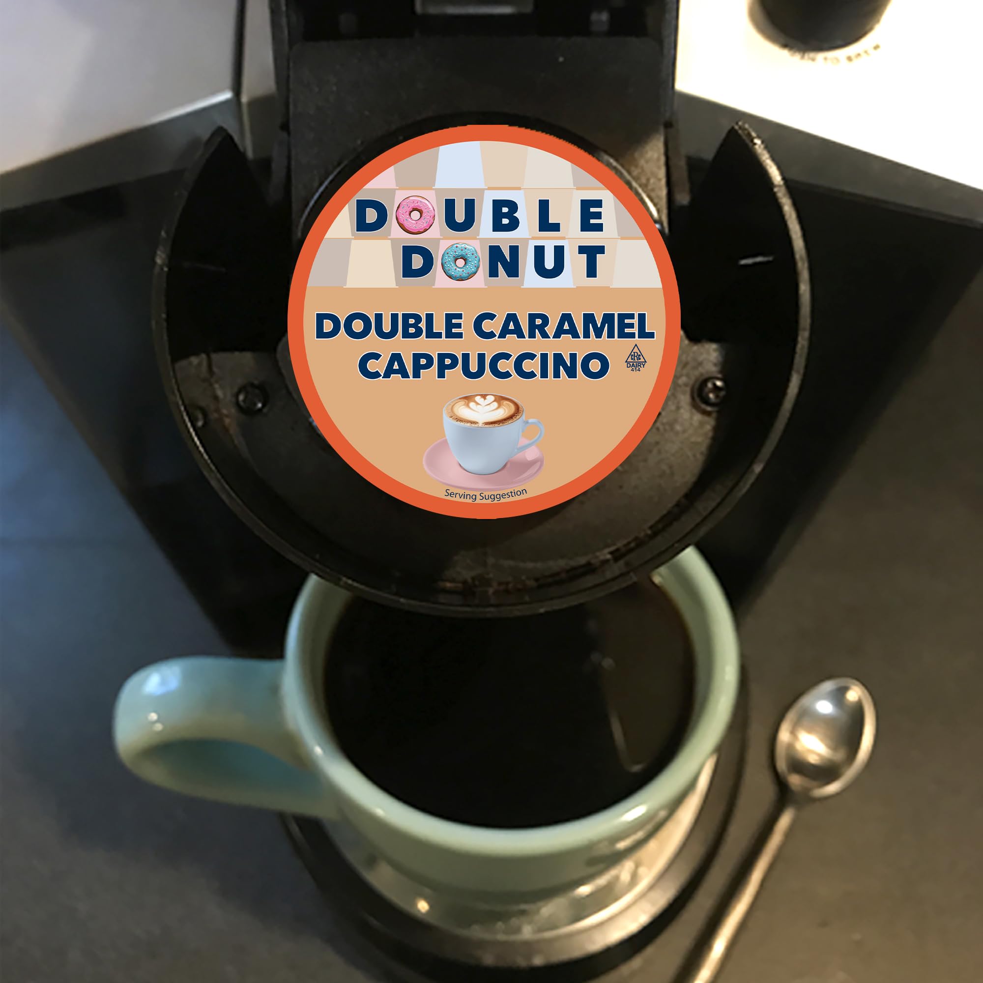 Cozy morning setup with Double Donut cappuccino on mug.