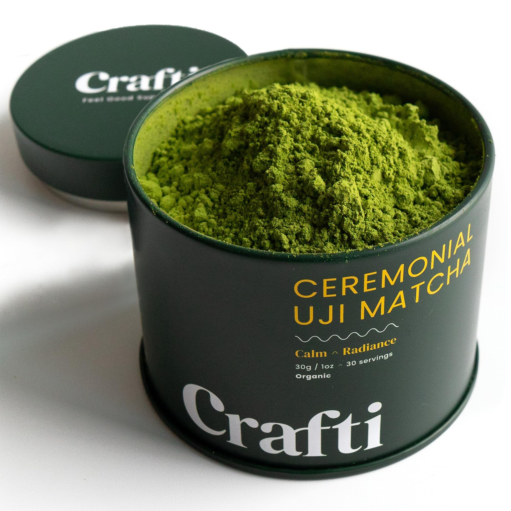 Crafti ceremonial-grade matcha powder in a jar with vibrant green color for smooth sips.