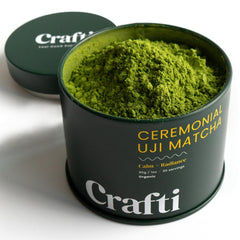 Crafti ceremonial-grade matcha powder in a jar with vibrant green color for smooth sips.