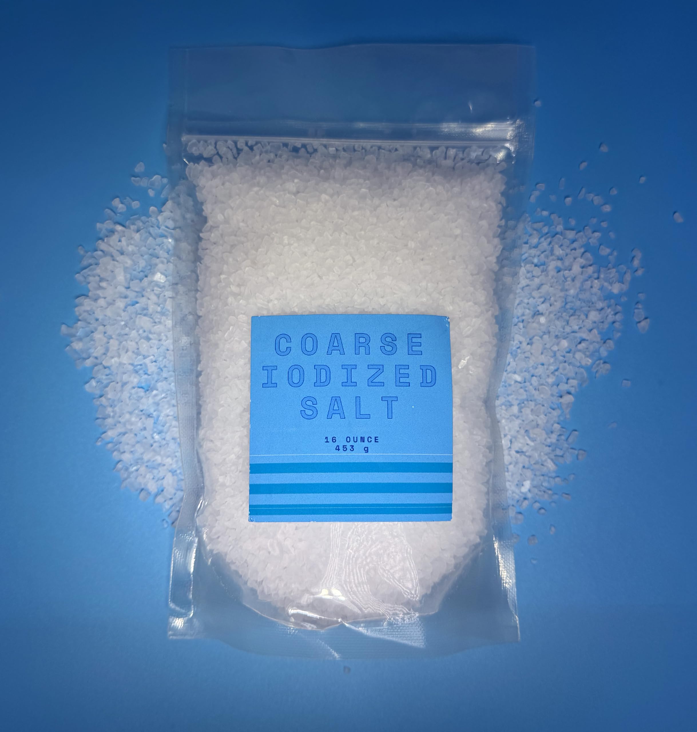 Crait salt grinder in use during meal prep for even seasoning.