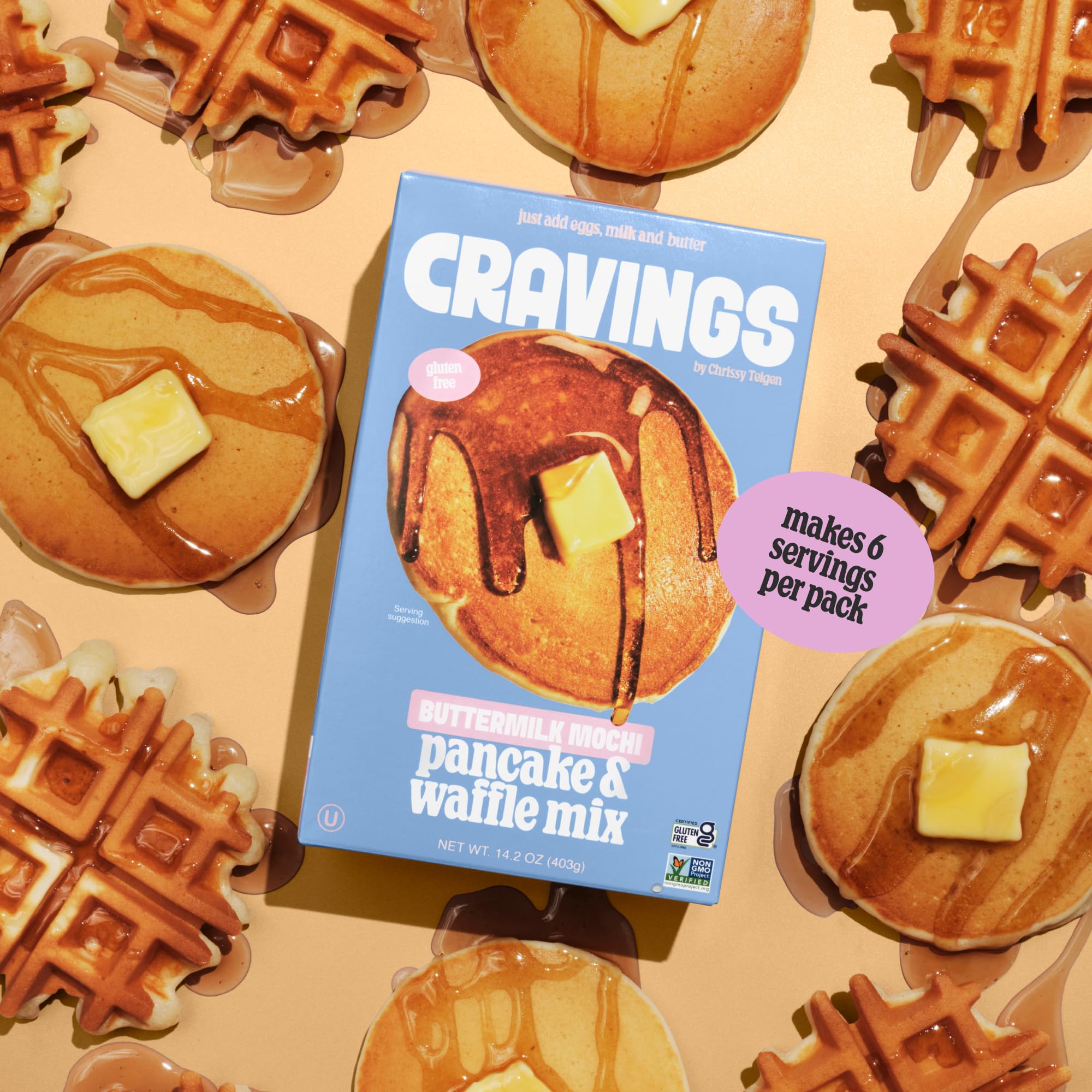 Cravings by Chrissy Teigen adding eggs, milk, and oil for batter.
