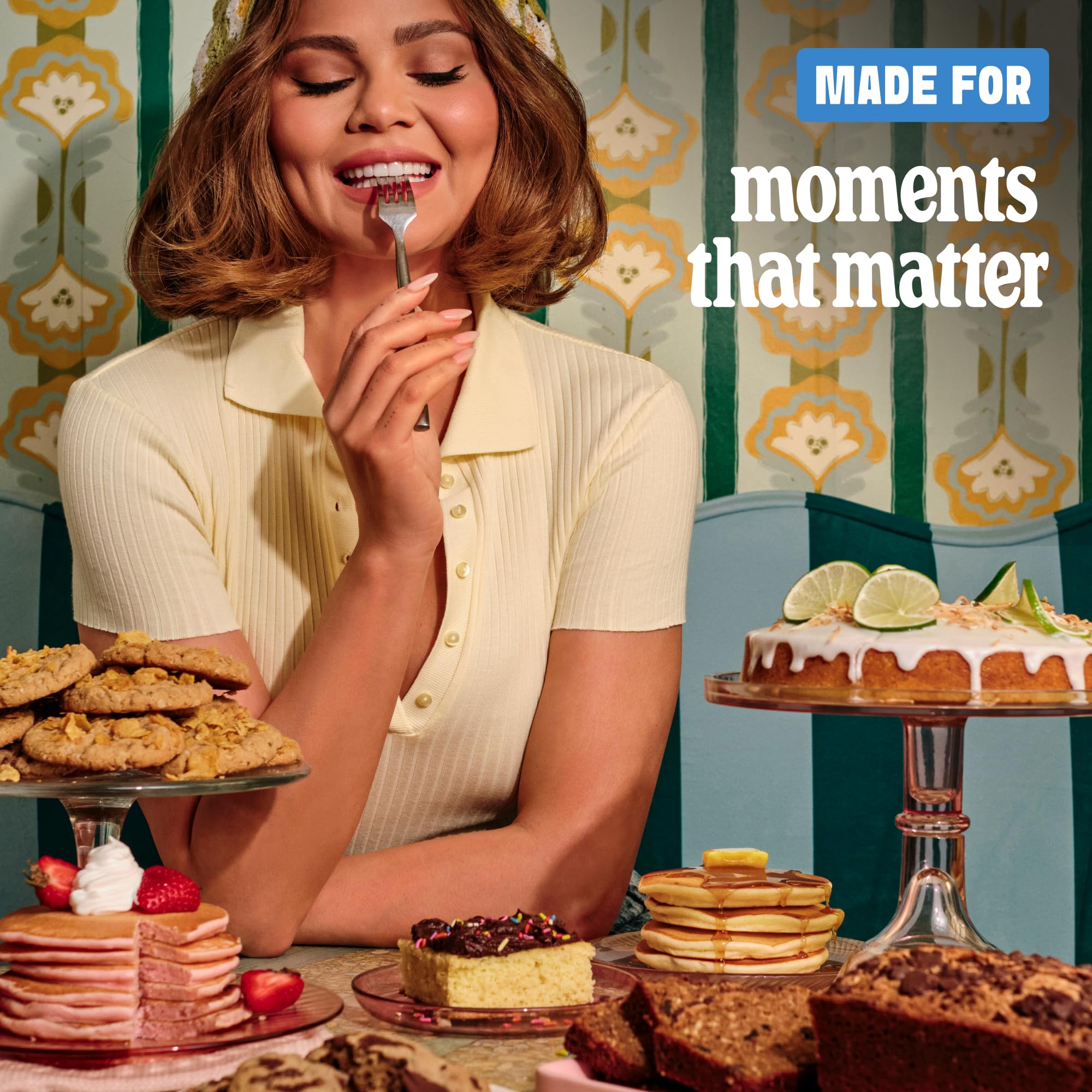 Cravings by Chrissy Teigen family brunch table enjoying gluten free breakfast.