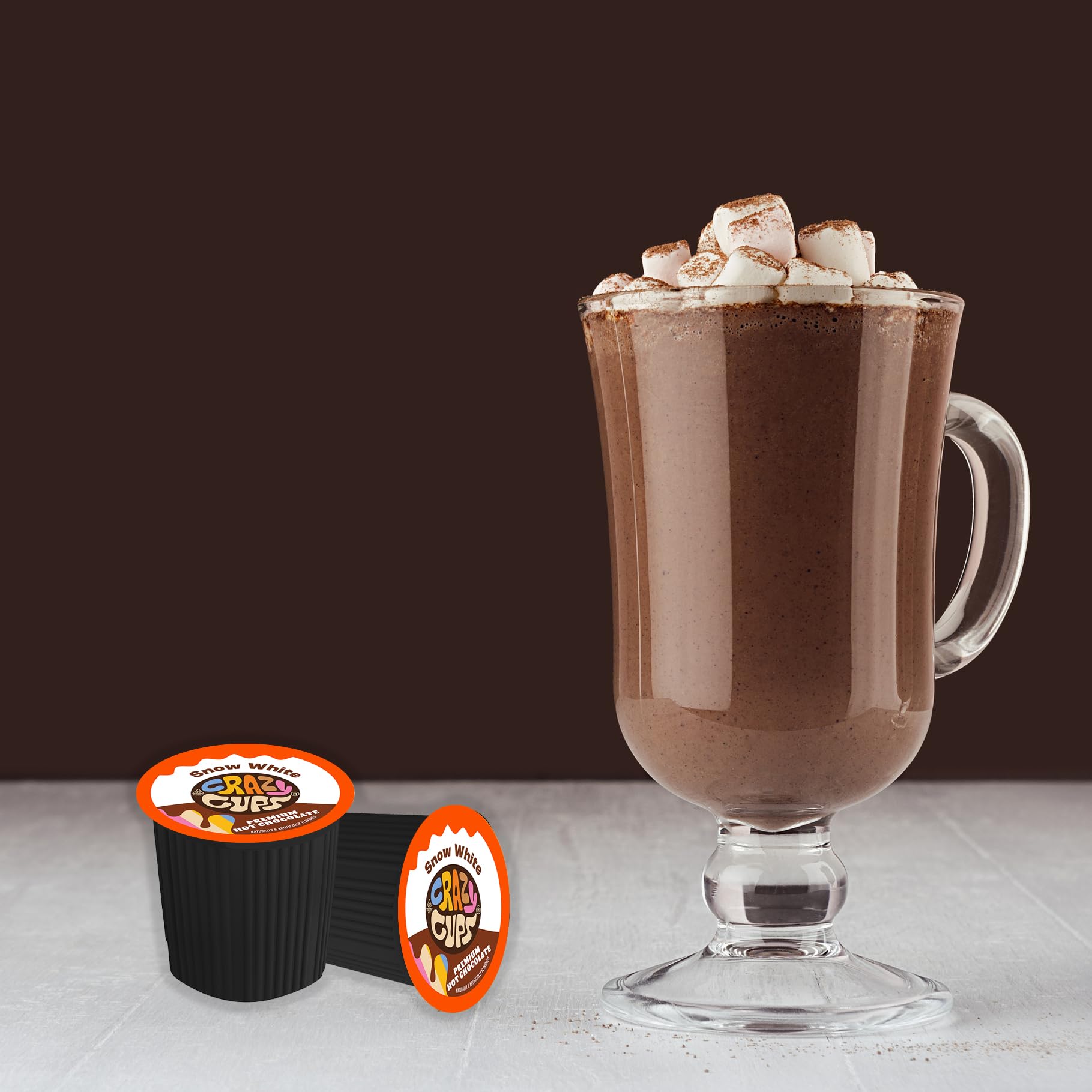 Crazy Cups pod pouring into cup, ready to sip