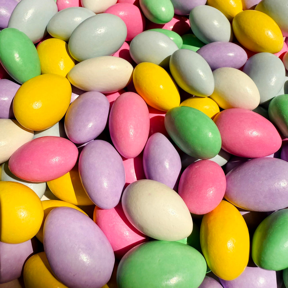 CrazyOutlet Jordan almonds with pastel candy shells, ideal for elegant wedding favors.