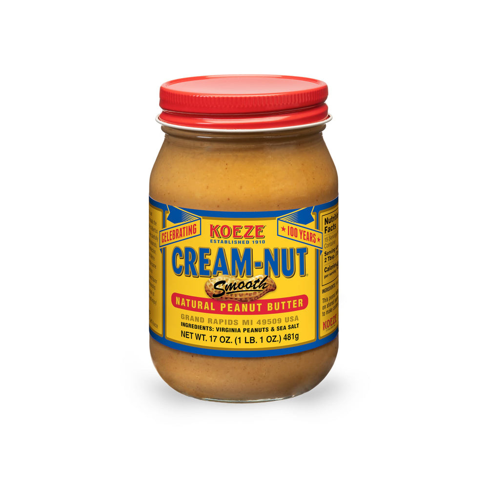 Cream Nut natural smooth peanut butter jar on a counter, ideal for quick breakfasts.