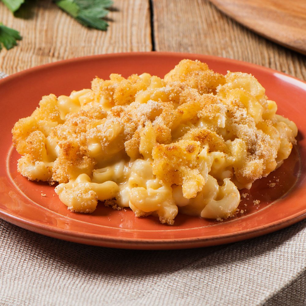 Creamette elbow macaroni in pasta salad bowl for texture and flavor.