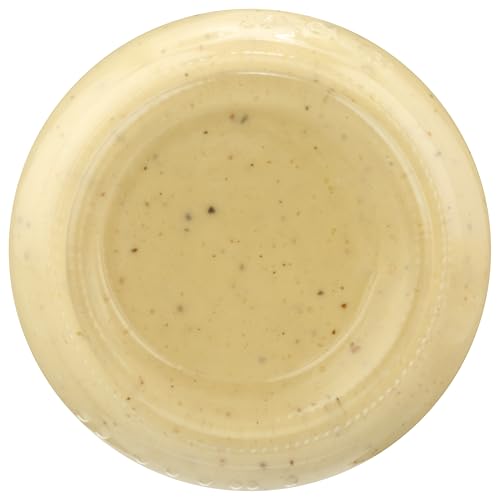 CREDO Roasted Garlic Alfredo bottle pouring emphasizes sauce texture