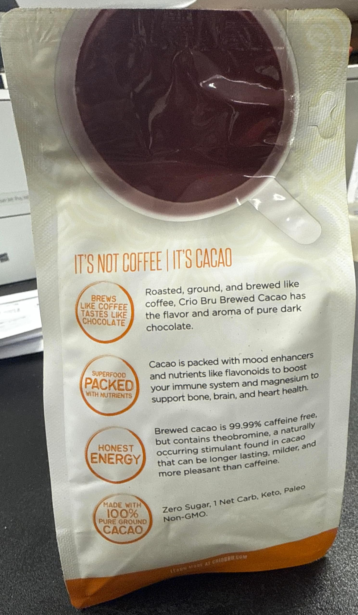 Crio Bru cacao beans image emphasizes 100% cacao origin.