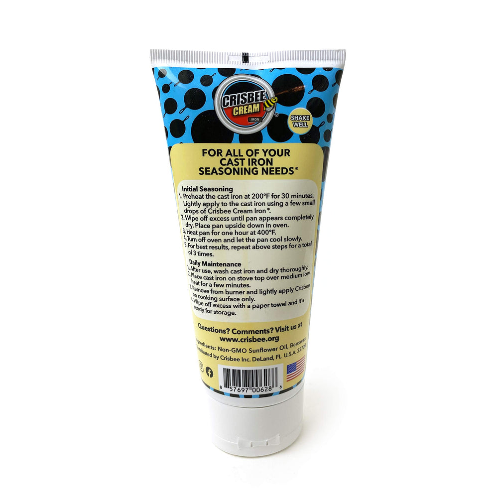Crisbee Cream Iron bottle close-up highlighting the oil for pan care.
