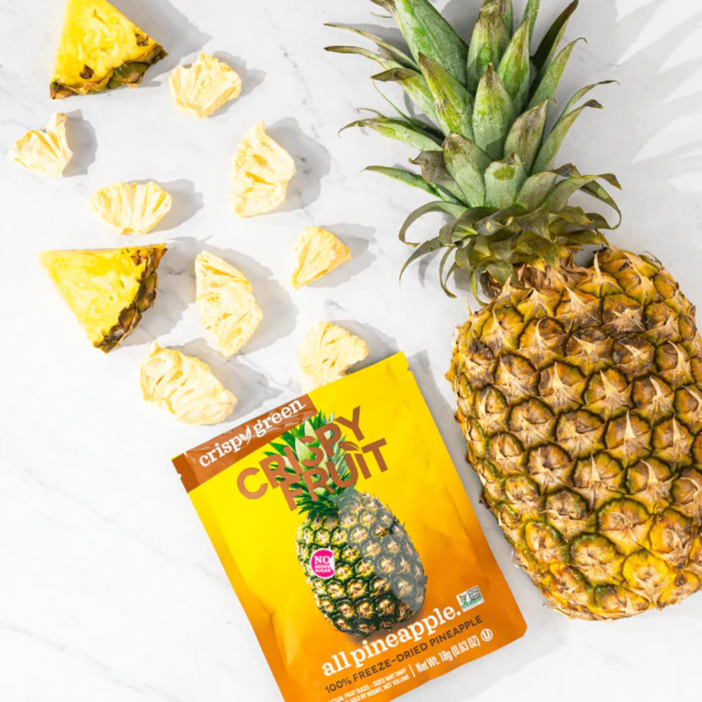Crispy Green freeze-dried pineapple snacks in a lunchbox for smart snacking
