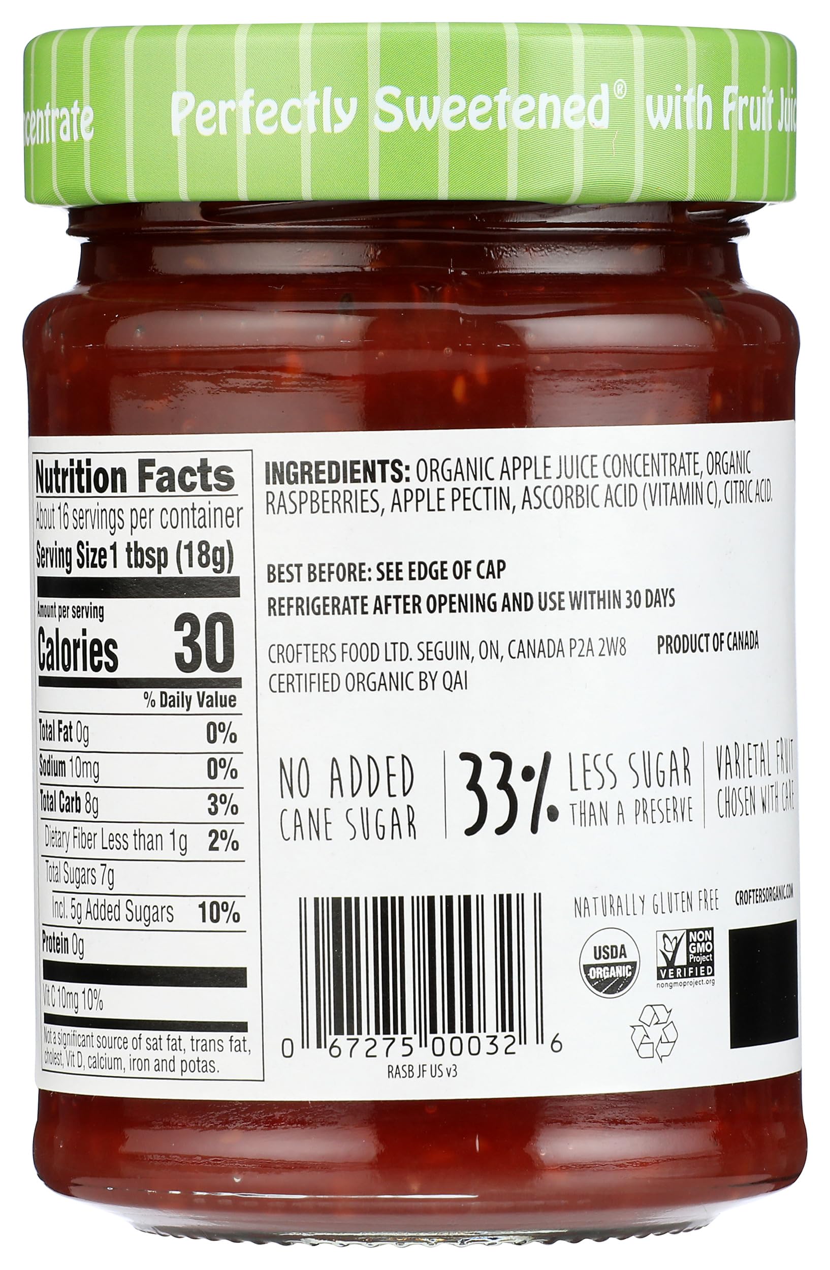Crofters Organic Raspberry Fruit Spread pour shows glossy drizzle perfect for toast or yogurt.