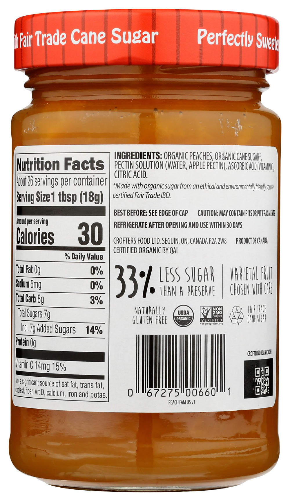 Crofters Peach Organic Premium Spread closeup on jar lid, highlighting bright fruit flavor.