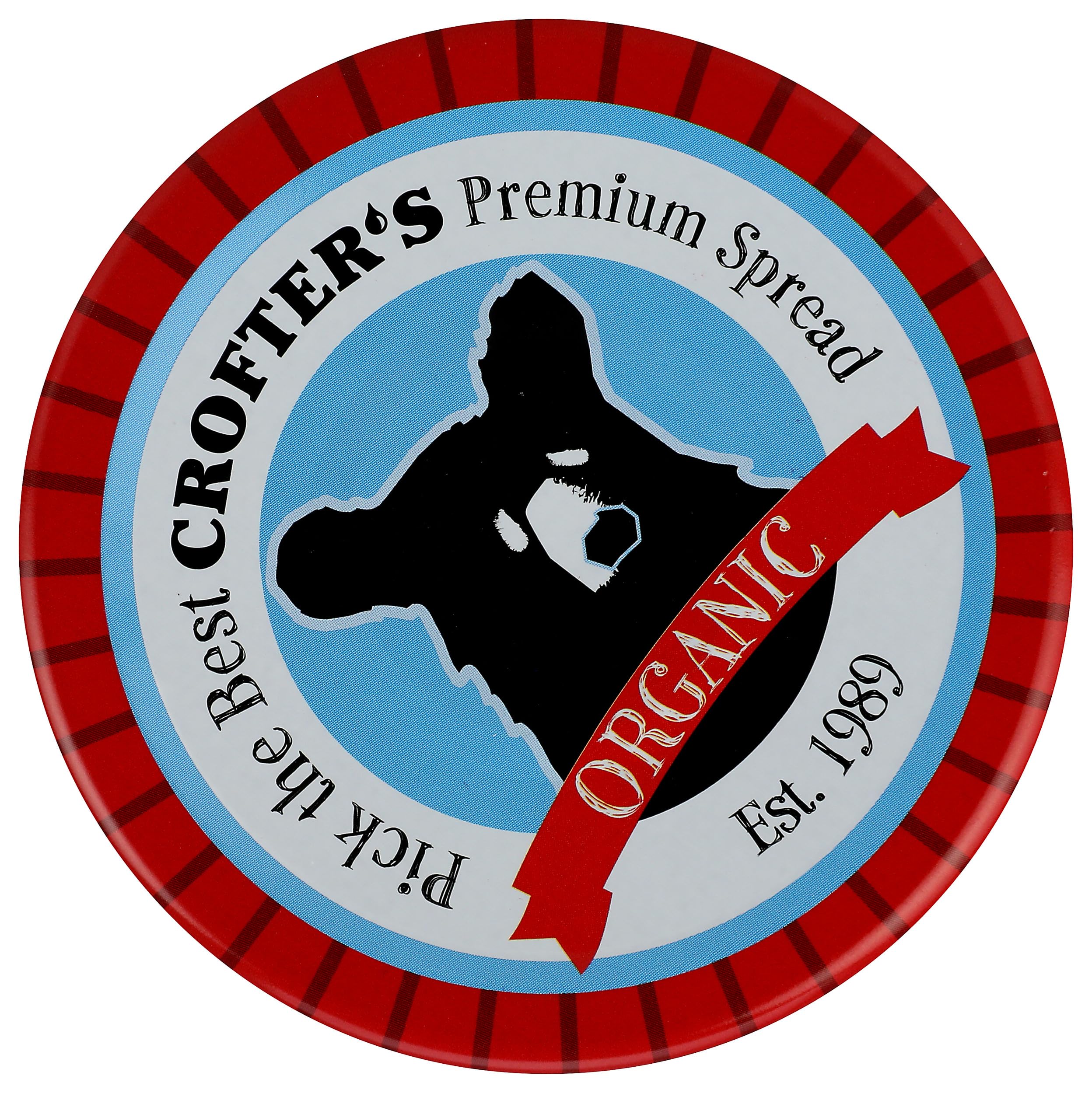 Spoonful of Crofters spread showing smooth, glossy texture.