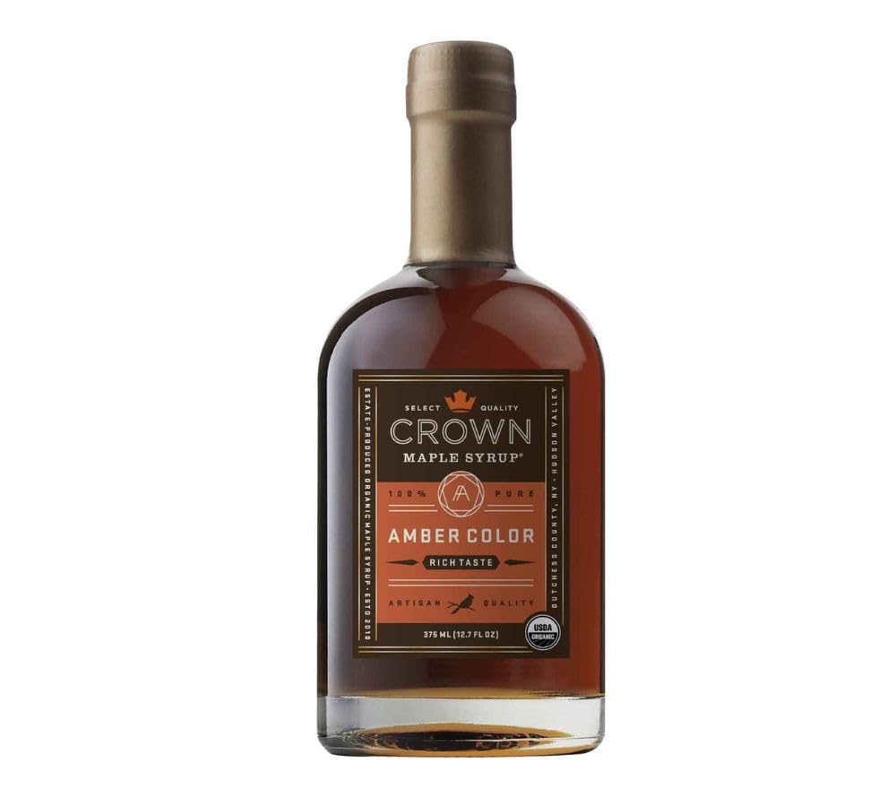 Crown Maple Amber Color syrup bottle pour, ideal for glazes, marinades, and pancakes.