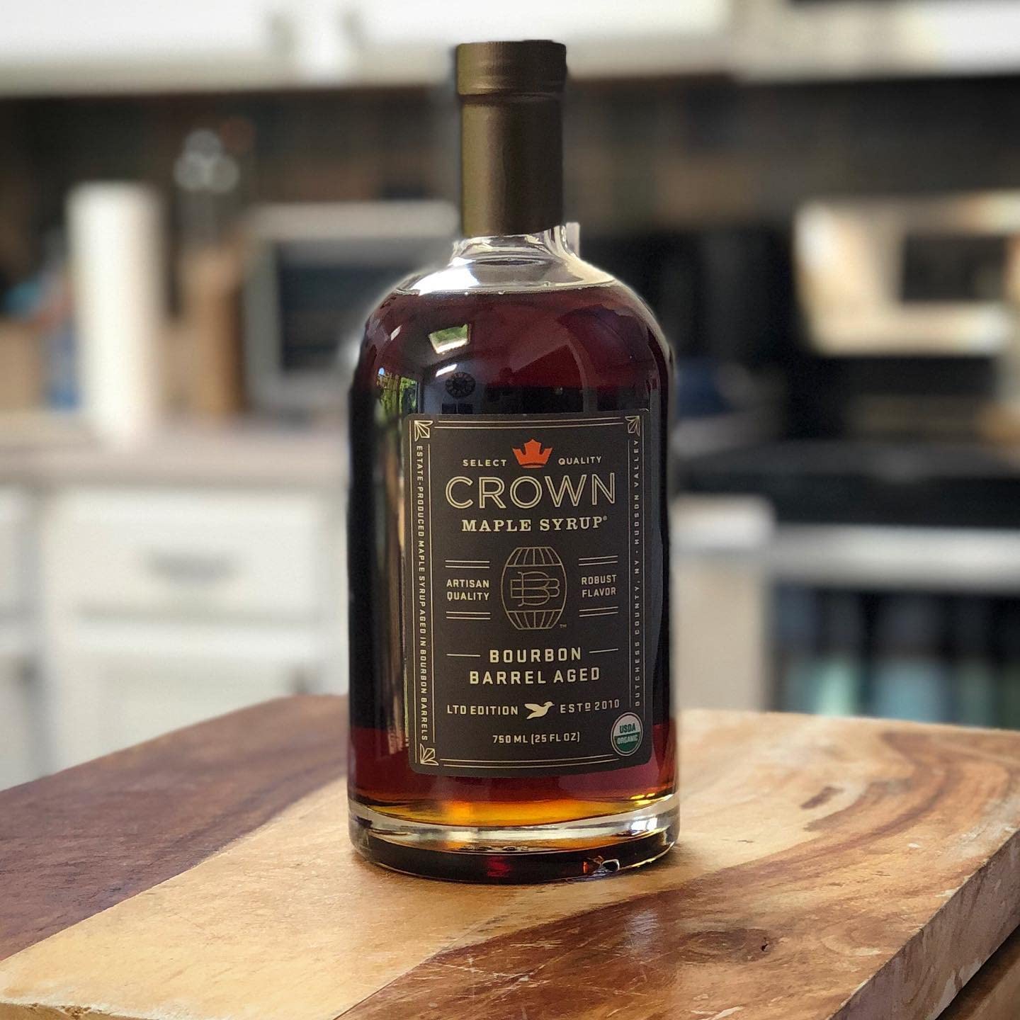 Crown Maple syrup drizzled over pancakes to enrich breakfast flavor.