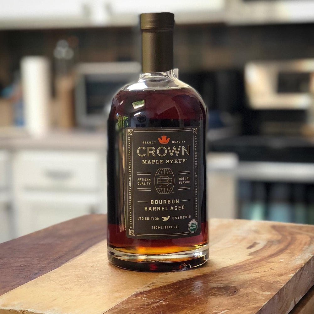 Crown Maple syrup drizzled over pancakes to enrich breakfast flavor.