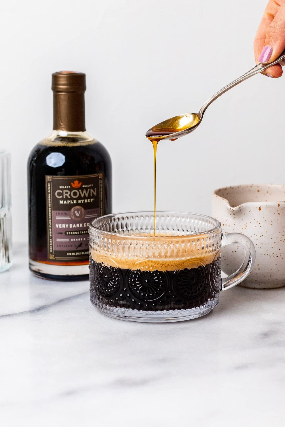Crown Maple Very Dark Color pantry bottle signals versatile kitchen staple.