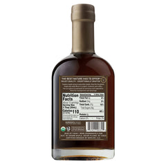 Crown Maple Very Dark Color syrup pours smoothly for rich culinary depth.