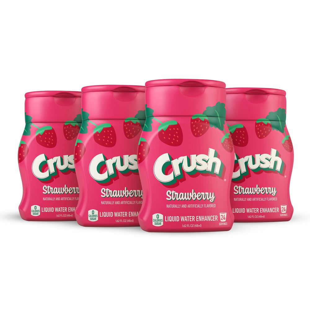 Crush Strawberry Liquid Water Enhancer bottle pouring flavor into a glass for zero sugar hydration
