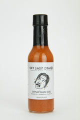 Cry Baby Craig's habanero garlic hot sauce bottle pour adds bright heat to dishes