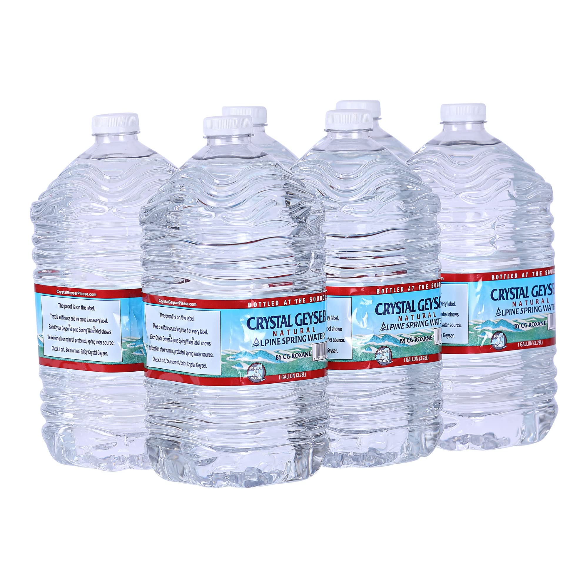 Crystal Geyser Alpine Spring Water 6-gallon jug on kitchen counter for home hydration.