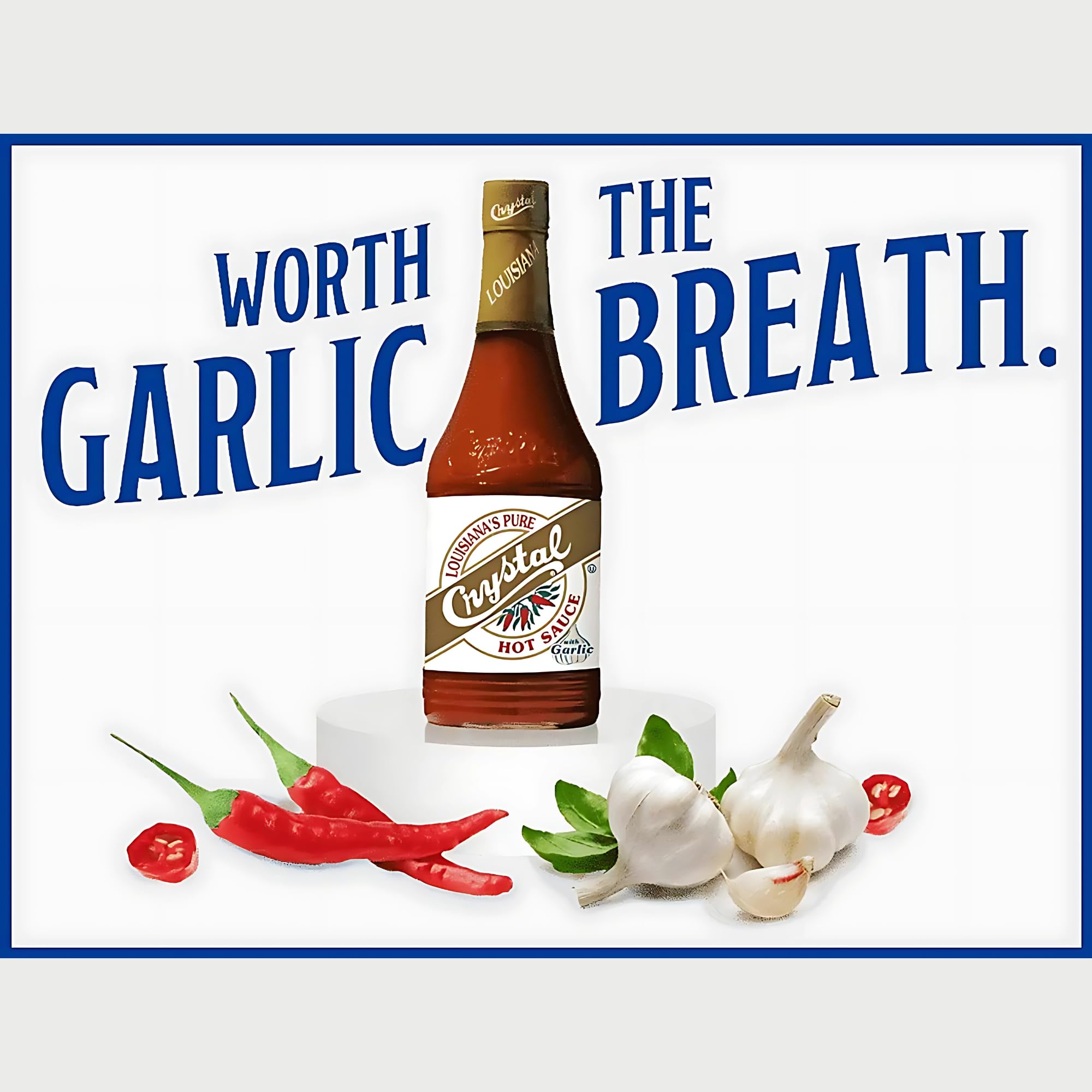 Crystal Garlic hot sauce beside Bloody Mary for a spicy kick.