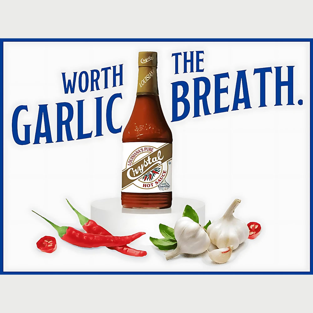 Crystal Garlic hot sauce beside Bloody Mary for a spicy kick.