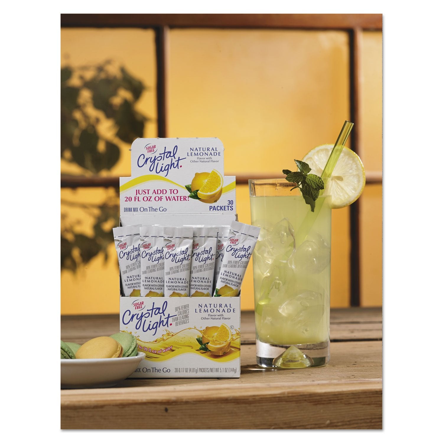 Crystal Light Lemonade being poured into water for refreshing flavor.