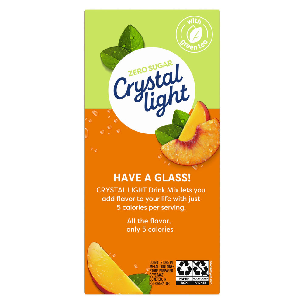Individual Crystal Light Peach Mango Green Tea Drink Mix packet dissolving in water.