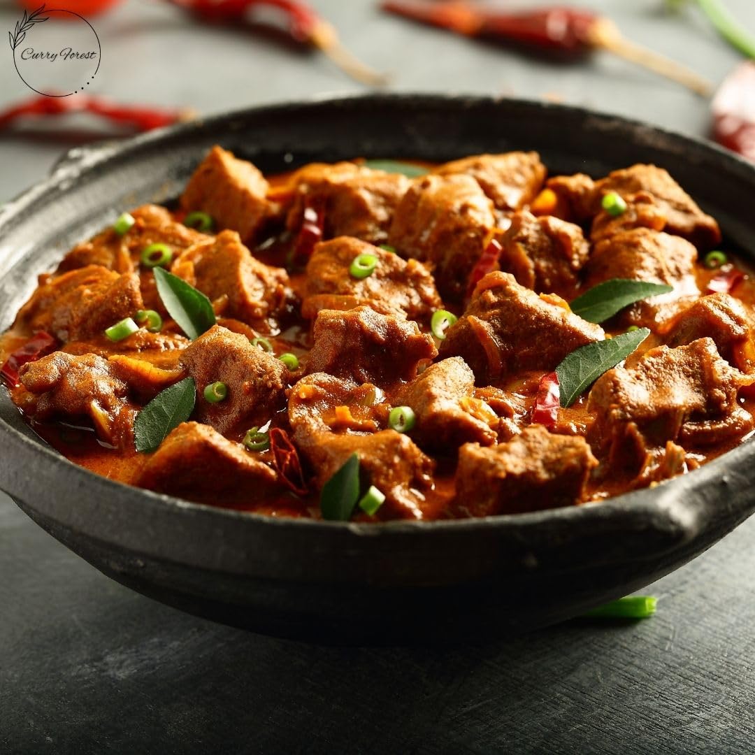 Curry Forest dried leaves in cooking context hint at authentic home-cooked flavor.